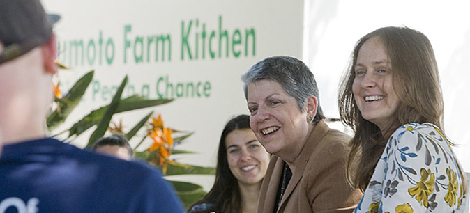 UC President Janet Napolitano listens to the first class of UC Global Food Initiative student fellows discuss their projects at Matsumoto Family Farm in Del Rey.