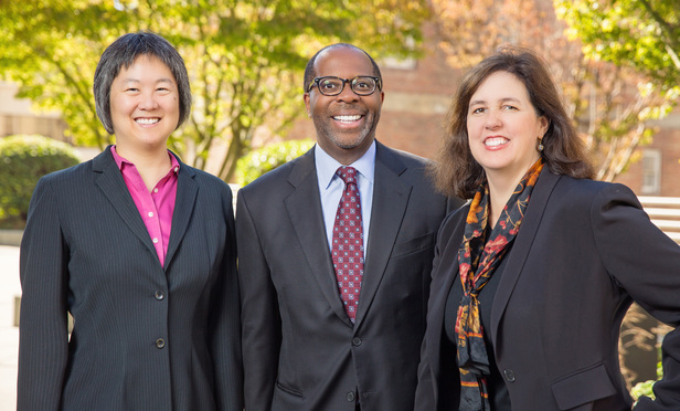 Left to right: Margaret Wu, managing counsel, Charles Robinson, general counsel vice president and Karen Petrulakis, chief deputy general counsel
