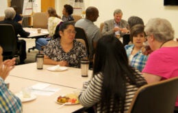 UCOP staff in Franklin Lobby One at first friday breakfast