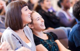 Students laughing in classroom