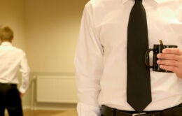 two co-workers at odds