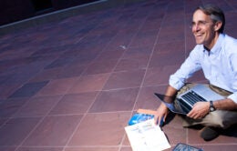 UC person with a laptop