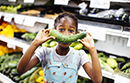 Girl with vegetable