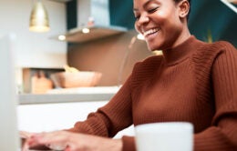 Woman working on laptop computer