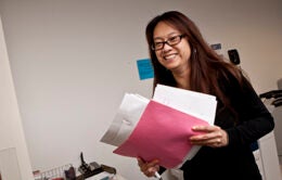 woman holding papers