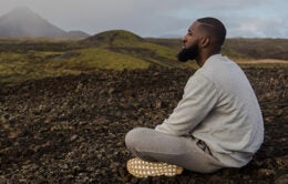 Seated man being contemplative