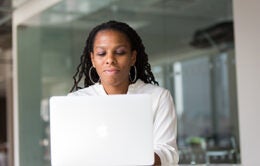 Woman working on laptop