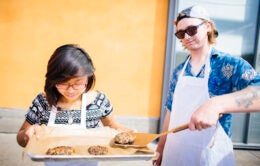Students grilling veggie burgers