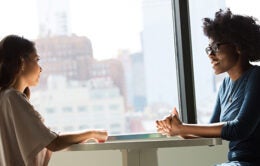 Two women talking