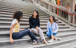 Women talking on steps