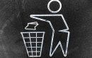 Illustration of figure throwing waste in a bin