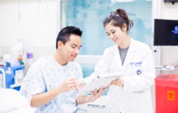 Doctor and patient reviewing chart