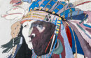 Mural portraying a Native American wearing a feather headdress
