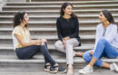 Three women having a conversation