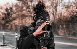 Person filming with video camera