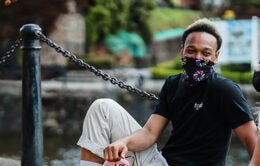 friends talking while wearing face masks