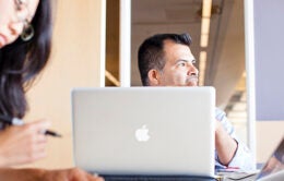 man working on laptop