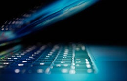 Open laptop glowing blue light