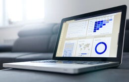 laptop displaying charts