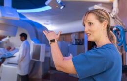 A nurse explains a procedure at UCLA Health.