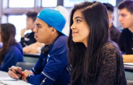 UC students sitting in a classroom