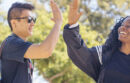 UC Davis students sharing a high-five