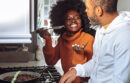 Couple cooking together in a kitchen