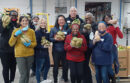 Volunteers at the Alameda County Community Food Bank on Dec. 8, 2022