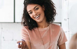 Woman holding pointer