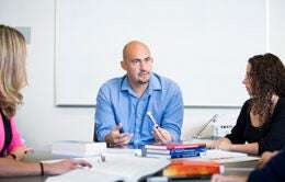 People talking around a conference table