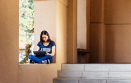 UC Riverside student working on campus