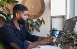Man working at laptop computer