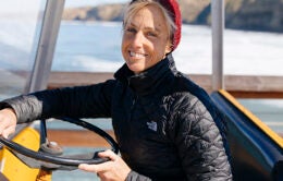 Woman driving a boat at UC San Diego