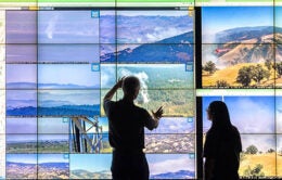 ALERTCalifornia team members in UC San Diego's WAVE Visualization space.