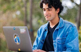 Man working on laptop computer