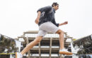 UC San Diego student leaps in front of the Giesel Library