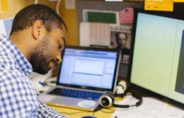 UC researcher working at computer