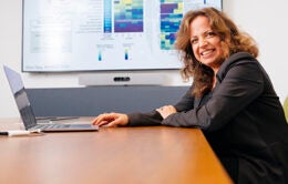 Woman working at a laptop computer at UC