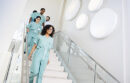 Group of UC Davis nurses descending the stairs