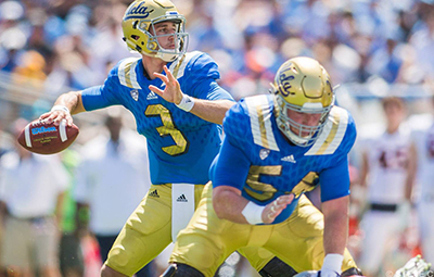 UCLA football players during a 2015 match