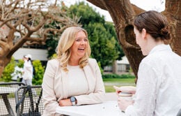 Women chatting outside at UC Santa Barbara
