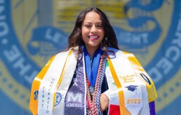 Kimberly Farias in her graduation regalia