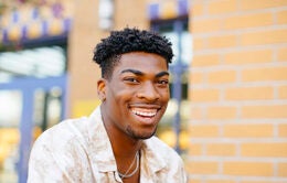 Smiling man working outside at UC Irvine