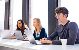 People working together around a conference table