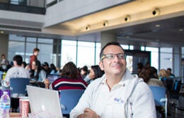 Man sitting in a cafeteria