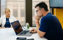 Man working at a computer in an office