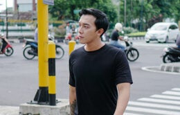 Man walking across the street