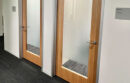 Privacy glass on doors of Oakland focus rooms