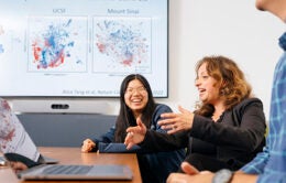 Alice Tang + colleagues in conference room