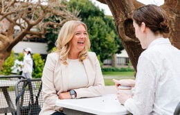 Colleagues chatting outside at UC Santa Barbara